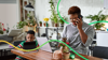 Woman On Mobile Working From Home With Child