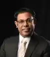 Dr Raman K Attri