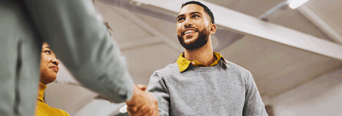 Two colleagues shaking hands